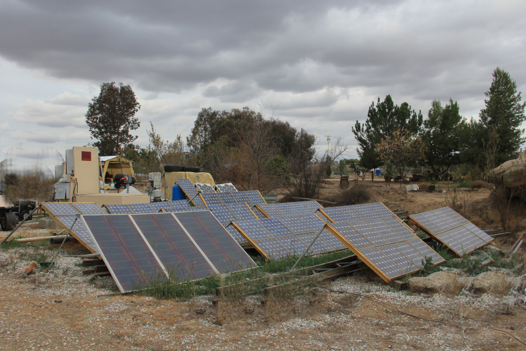 Artist Hangout - Rammed Earth House Construction 48 - Solaterre's Ground Mounted Solar Panels