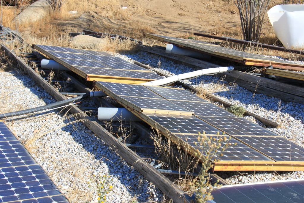 Artist Hangout - Rammed Earth House Construction 49 - Solaterre's Ground Mounted Solar Panels