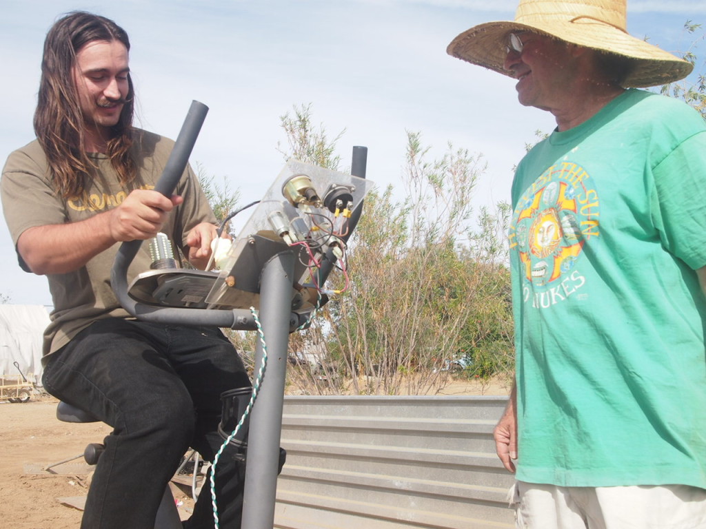 Artist Hangout - Rammed Earth House Construction 59 - Recycled fitness bicycle converted to pedal powered generator